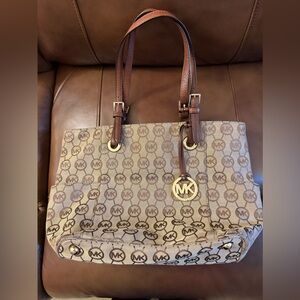 Michael Kors jet set tote bag with encircled monogram and gold hardware